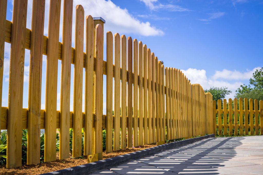 a bar type wooden fence