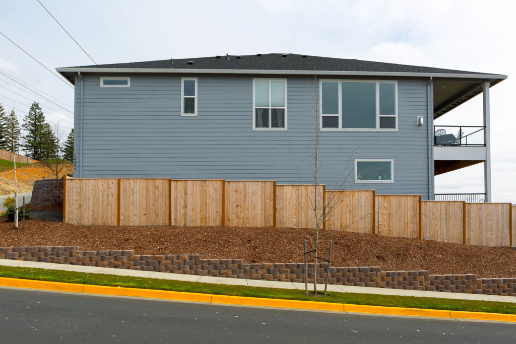 a house with cedar fence